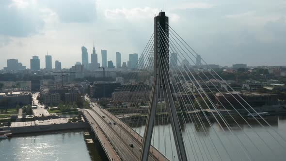 Aerial view of Świętokrzyski Bridge and Warsaw city skyline in the background. Warsaw, Poland.