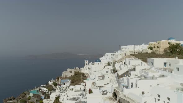 Aerial view of traditional houses on Santorini island, Imerovigli, Greece.