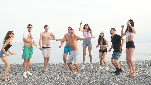 Best Friends Dancing at Beach on Sunny Day