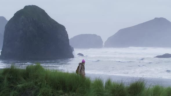 Woman Traveler of Cloudy Rainy Day at Rocky Beach 6K Cinematic Ocean Coast USA