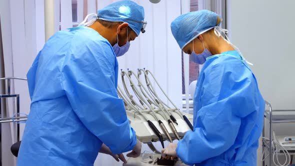 Dentists working in dental clinic