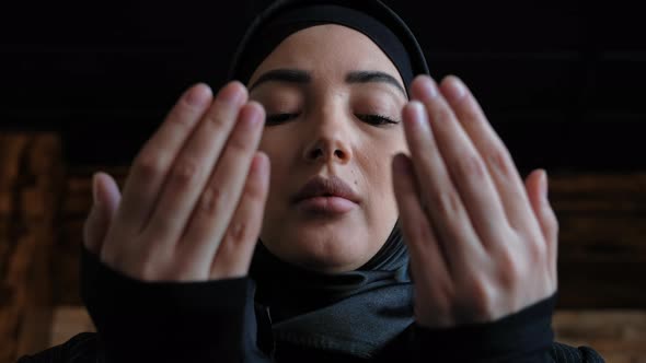 Young Muslim Woman in Hijab Praying Namaz