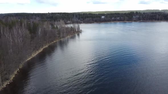 Aerial View of the Vuoksi River, the Forest and the Settlement in Autumn Day, Losevo, Leningrad