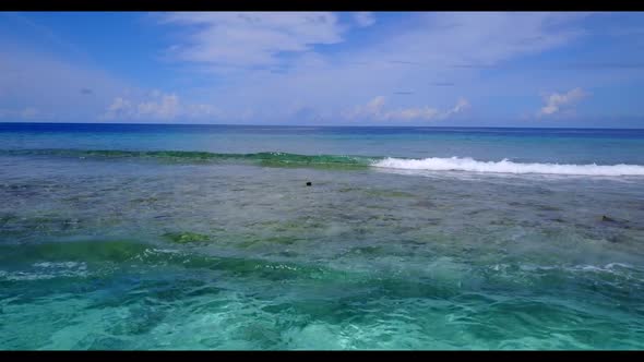 Aerial flying over tourism of tropical coast beach time by turquoise sea with white sand background 