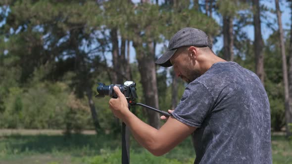 Photographer with a camera in nature. 