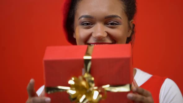 Smiling Woman Hiding Behind Red Giftbox, Preparing Present for St Valentines Day