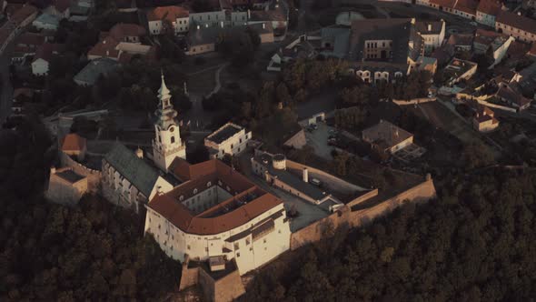 Aerial view of Nitra Historic Castle and old town at sunset