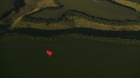 Balloon Hovering Above The Forest. Aerial View