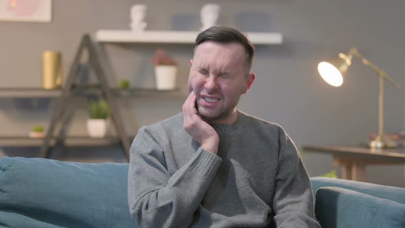 Portrait of Sick Casual Man Having Toothache