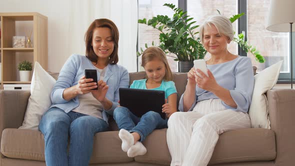 Mother, Daughter and Grandmother with Gadgets 52