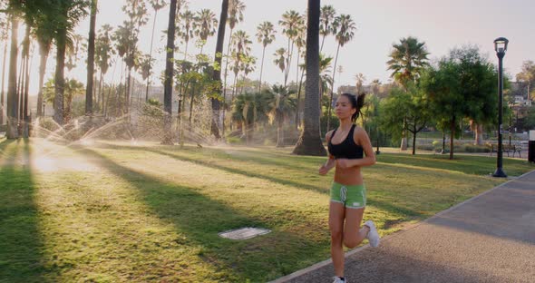 Athlete Woman Jogging In The Park