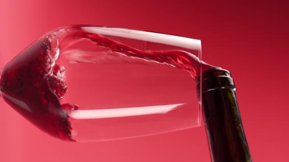 Vertical video, Close-up: red wine is poured into a glass