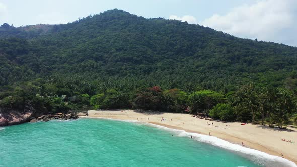 Aerial drone view landscape of tranquil tourist beach time by blue water with white sand background 