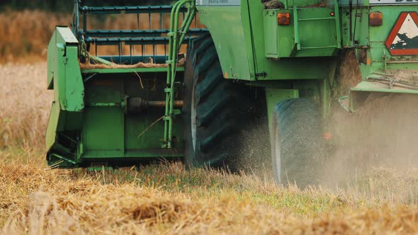 Back View Of A Tractor In An Agricultural Field