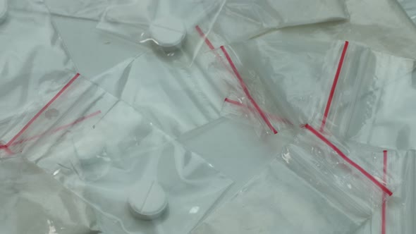 Portions Of Cocaine And Tablets