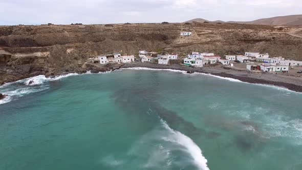 Aerial view of village Puertito de Molinos and hidden beach in Fuerteventura.