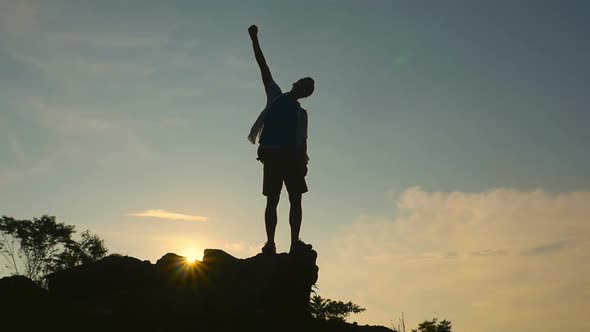 Silhouette Man Celebrating Success With Sunset