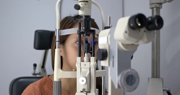 Woman check on eye in the clinic