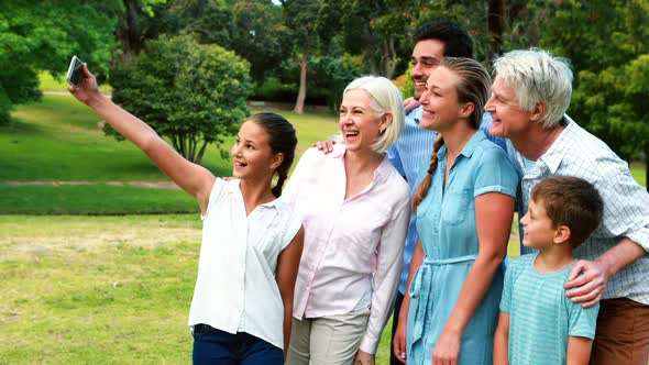 Multi-generation family taking a selfie on a mobile phone