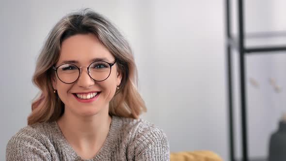 Adorable Young Feminine in Glasses Laughing Having Fun