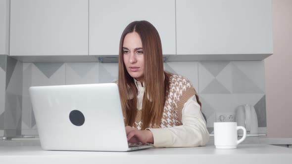 Shocked Businesswoman Getting Bad Results of Project