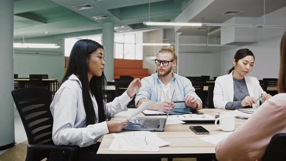 Businesswoman Boss Conveying Ideas Concerning to Startup Project to Group of Diverse Colleagues