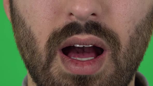 Frightened Guy with a Beard. Close Up