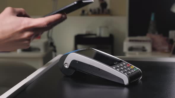 Animation 3d Motion Design of Customer is Paying with Smartphone in Shop Using NFC Contactless