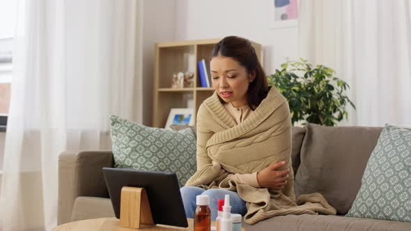 Sick Woman Having Video Call on Tablet Pc at Home