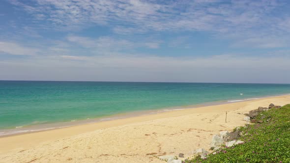 Aerial View White Drone Flying  Above The White Beach