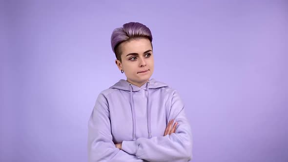 Young Woman Thinking Searching Solution Holding Arms Crossed Indoors