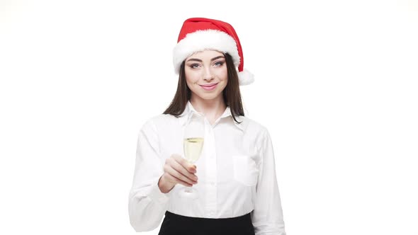 Businesswoman with a Glass of Champagne Giving a Toast Celebrates for Christmas Day