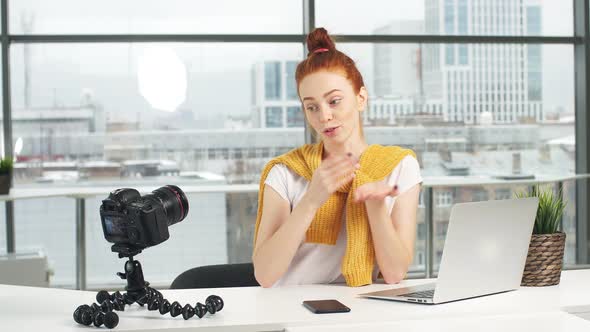 Cheerful Female Blogger Recording Video