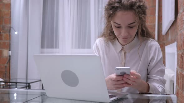 Female Browsing Online on Smartphone, internet Searching