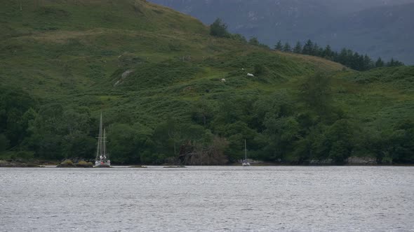 Boats anchored at shore