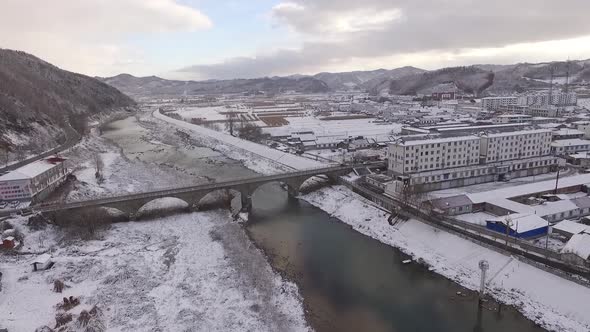 Shot Of Rivers And Bridges Over Villages And Rivers In Snow And Ice1