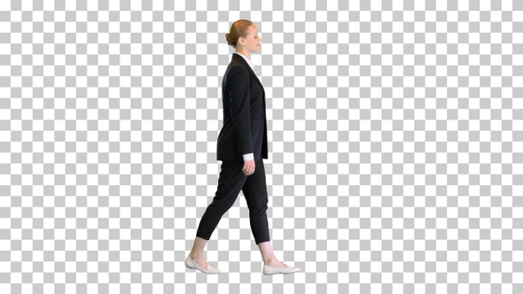 Attractive blonde business woman walking, Alpha Channel