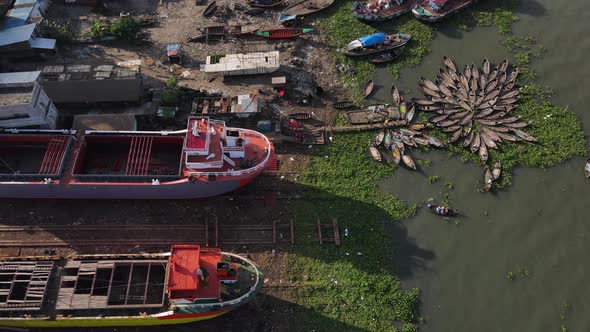 Aerial across illegal dockyards on the Buriganga River - Dhaka Bangladesh