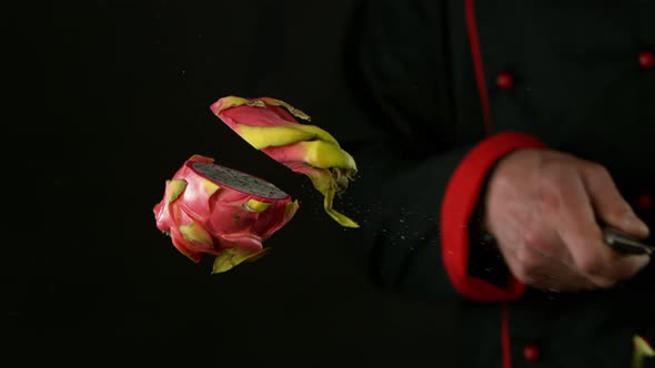Super Slow Motion Shot of Chef Chopping Pitahaya in the Air at 1000 Fps