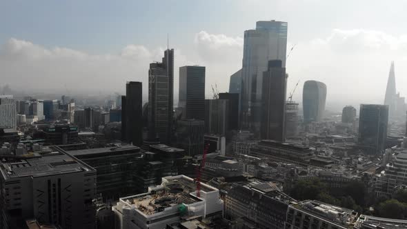 Aerial view of London skyline tallest skyscrapers on a hazy day