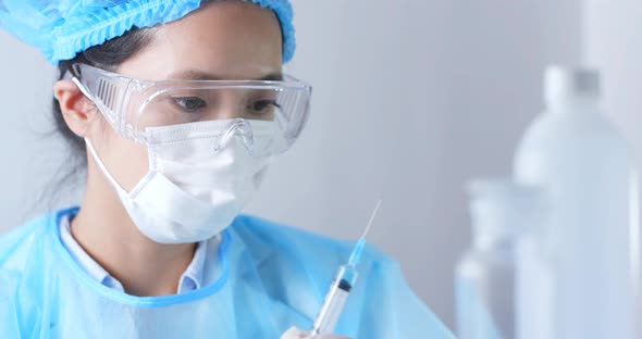 Nurse with syringe