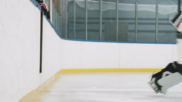 Hockey Players Going Out On Ice Rink