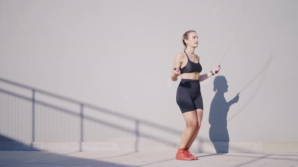 Cinematic action footage of a sport woman training