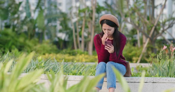 Woman enjoy and look at the plant and flower