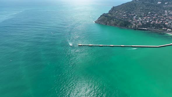 The yacht calls at the port aerial view 4 K