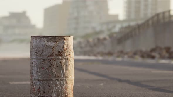 Old Rusty Metal Barrel on the Street alt