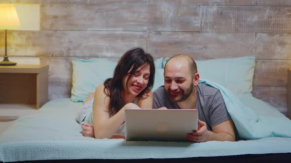 Zoom in Shot of Couple Wearing Pajamas