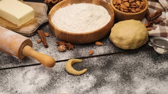 Woman Hands Closeup  Making Traditional German or Austrian Vanillekipferl Vanilla Kipferl Cookies