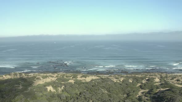 Ocean Waves breaking on Beach Coastal Aerial View