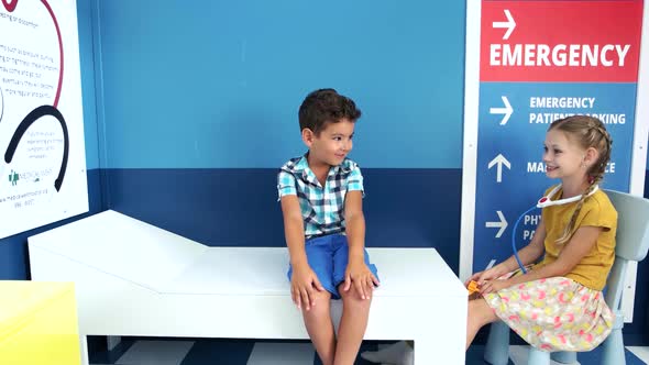 Children Playing Doctor in Kindergarten